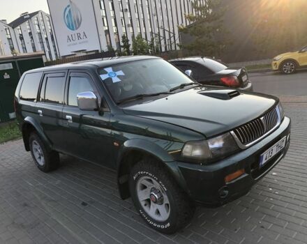 Зелений Міцубісі Паджеро Спорт, об'ємом двигуна 2.5 л та пробігом 338 тис. км за 2600 $, фото 2 на Automoto.ua