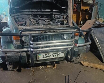 Зелений Міцубісі Паджеро Спорт, об'ємом двигуна 2.45 л та пробігом 120 тис. км за 3000 $, фото 2 на Automoto.ua