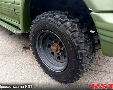 Зеленый Мицубиси Паджеро Спорт, объемом двигателя 2.9 л и пробегом 300 тыс. км за 2399 $, фото 6 на Automoto.ua