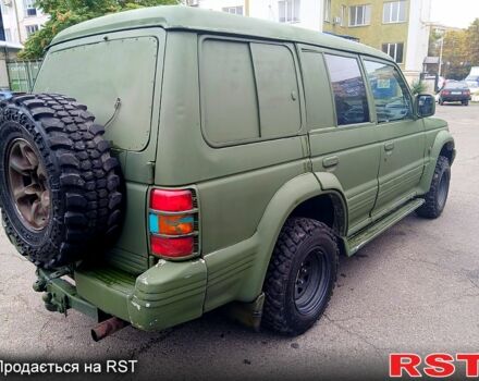 Зеленый Мицубиси Паджеро Спорт, объемом двигателя 2.9 л и пробегом 300 тыс. км за 2399 $, фото 2 на Automoto.ua