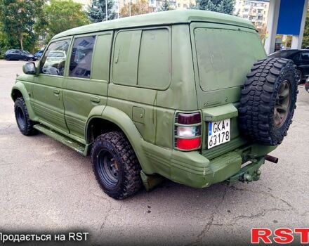 Зеленый Мицубиси Паджеро Спорт, объемом двигателя 2.9 л и пробегом 300 тыс. км за 2399 $, фото 3 на Automoto.ua