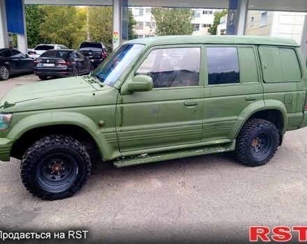 Зеленый Мицубиси Паджеро Спорт, объемом двигателя 2.9 л и пробегом 300 тыс. км за 2399 $, фото 4 на Automoto.ua