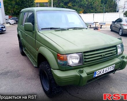 Зеленый Мицубиси Паджеро Спорт, объемом двигателя 2.9 л и пробегом 300 тыс. км за 2399 $, фото 1 на Automoto.ua