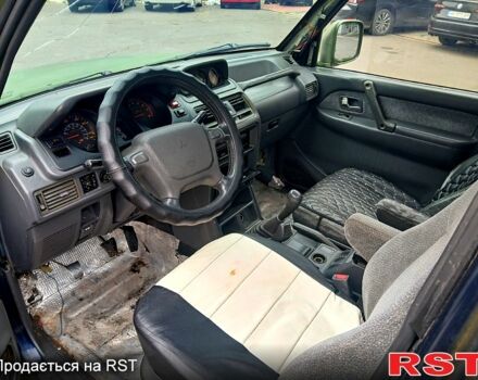 Зеленый Мицубиси Паджеро Спорт, объемом двигателя 2.9 л и пробегом 300 тыс. км за 2399 $, фото 7 на Automoto.ua