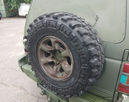 Зелений Міцубісі Паджеро Спорт, об'ємом двигуна 3 л та пробігом 300 тис. км за 2899 $, фото 9 на Automoto.ua