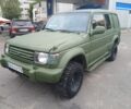 Зелений Міцубісі Паджеро Спорт, об'ємом двигуна 3 л та пробігом 300 тис. км за 2899 $, фото 1 на Automoto.ua