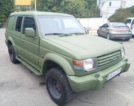 Зелений Міцубісі Паджеро Спорт, об'ємом двигуна 3 л та пробігом 300 тис. км за 2899 $, фото 7 на Automoto.ua