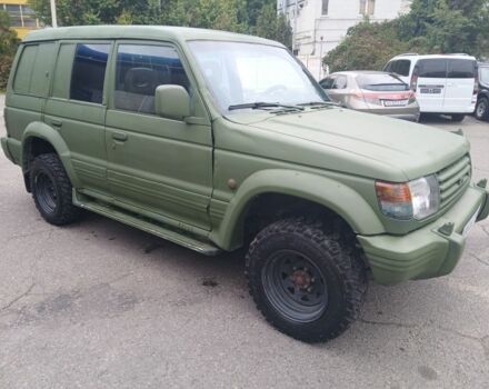 Зелений Міцубісі Паджеро Спорт, об'ємом двигуна 3 л та пробігом 300 тис. км за 2899 $, фото 4 на Automoto.ua