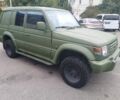 Зелений Міцубісі Паджеро Спорт, об'ємом двигуна 3 л та пробігом 300 тис. км за 2899 $, фото 4 на Automoto.ua