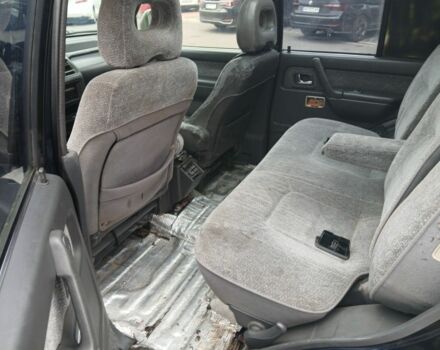 Зелений Міцубісі Паджеро Спорт, об'ємом двигуна 3 л та пробігом 300 тис. км за 2899 $, фото 12 на Automoto.ua