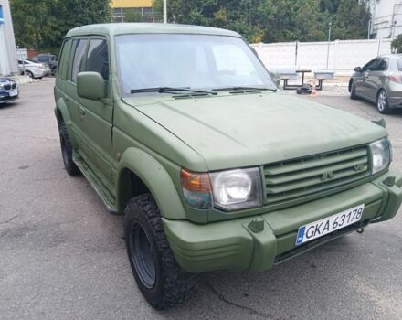 Зелений Міцубісі Паджеро Спорт, об'ємом двигуна 3 л та пробігом 300 тис. км за 2899 $, фото 5 на Automoto.ua