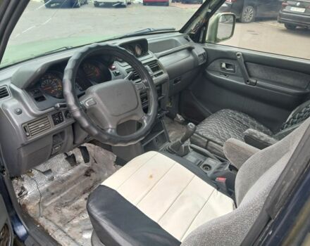 Зелений Міцубісі Паджеро Спорт, об'ємом двигуна 3 л та пробігом 300 тис. км за 2899 $, фото 11 на Automoto.ua