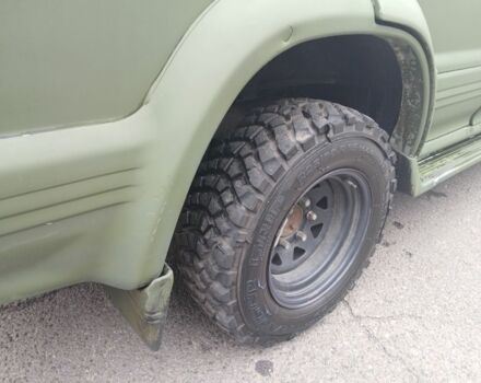 Зелений Міцубісі Паджеро Спорт, об'ємом двигуна 3 л та пробігом 300 тис. км за 2899 $, фото 6 на Automoto.ua