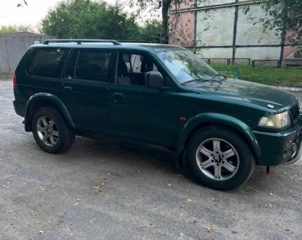 Зелений Міцубісі Паджеро Спорт, об'ємом двигуна 3 л та пробігом 304 тис. км за 4345 $, фото 5 на Automoto.ua
