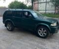 Зелений Міцубісі Паджеро Спорт, об'ємом двигуна 3 л та пробігом 304 тис. км за 4345 $, фото 5 на Automoto.ua