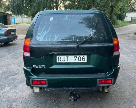 Зелений Міцубісі Паджеро Спорт, об'ємом двигуна 3 л та пробігом 304 тис. км за 4345 $, фото 2 на Automoto.ua