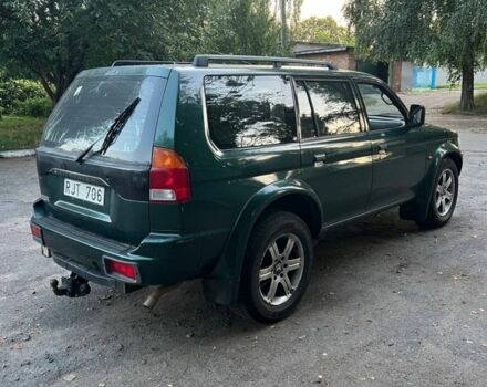 Зелений Міцубісі Паджеро Спорт, об'ємом двигуна 3 л та пробігом 304 тис. км за 4345 $, фото 6 на Automoto.ua
