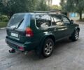 Зелений Міцубісі Паджеро Спорт, об'ємом двигуна 3 л та пробігом 304 тис. км за 4345 $, фото 6 на Automoto.ua