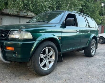 Зелений Міцубісі Паджеро Спорт, об'ємом двигуна 3 л та пробігом 304 тис. км за 4345 $, фото 7 на Automoto.ua
