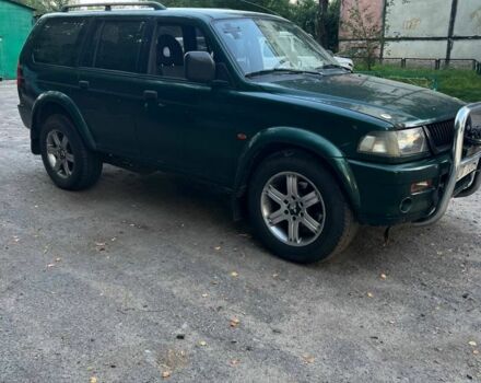 Зелений Міцубісі Паджеро Спорт, об'ємом двигуна 3 л та пробігом 304 тис. км за 4345 $, фото 4 на Automoto.ua