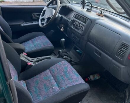 Зелений Міцубісі Паджеро Спорт, об'ємом двигуна 3 л та пробігом 304 тис. км за 4345 $, фото 3 на Automoto.ua