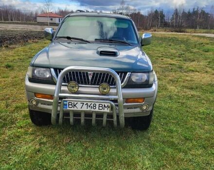 Зеленый Мицубиси Паджеро Спорт, объемом двигателя 2.5 л и пробегом 200 тыс. км за 6200 $, фото 4 на Automoto.ua