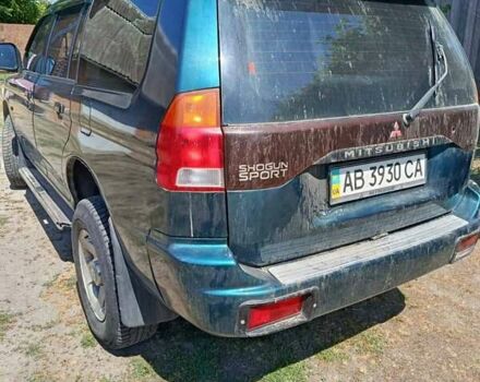 Зелений Міцубісі Паджеро Спорт, об'ємом двигуна 2.48 л та пробігом 320 тис. км за 5500 $, фото 7 на Automoto.ua