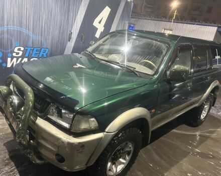 Зеленый Мицубиси Паджеро Спорт, объемом двигателя 3 л и пробегом 100 тыс. км за 4999 $, фото 1 на Automoto.ua