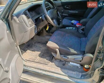 Зелений Міцубісі Паджеро Спорт, об'ємом двигуна 2.48 л та пробігом 320 тис. км за 5500 $, фото 2 на Automoto.ua