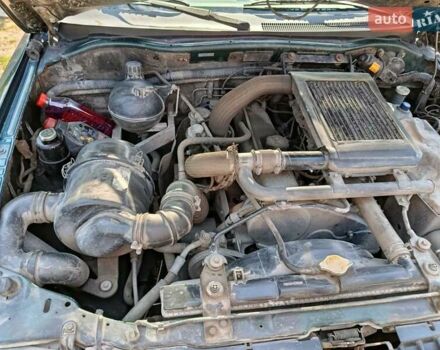 Зелений Міцубісі Паджеро Спорт, об'ємом двигуна 2.48 л та пробігом 320 тис. км за 5500 $, фото 5 на Automoto.ua