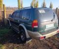 Зеленый Мицубиси Паджеро Спорт, объемом двигателя 3 л и пробегом 300 тыс. км за 5900 $, фото 2 на Automoto.ua