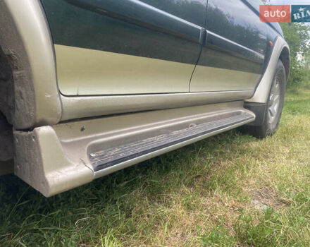 Зелений Міцубісі Паджеро Спорт, об'ємом двигуна 3 л та пробігом 315 тис. км за 5000 $, фото 7 на Automoto.ua