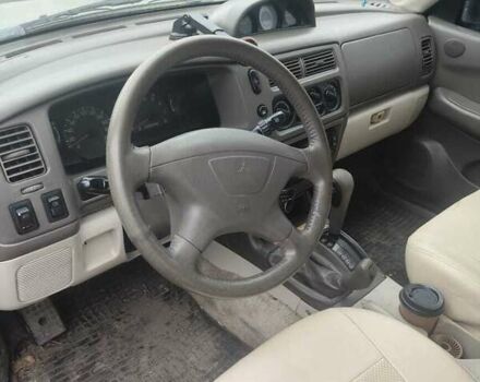 Зеленый Мицубиси Паджеро Спорт, объемом двигателя 2.97 л и пробегом 250 тыс. км за 4500 $, фото 2 на Automoto.ua