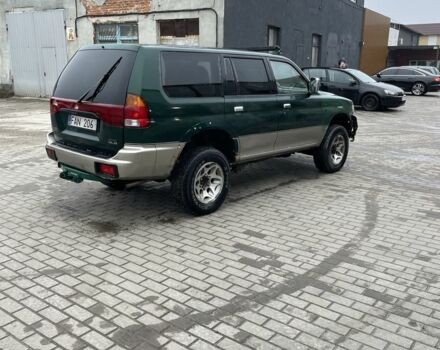 Зеленый Мицубиси Паджеро Спорт, объемом двигателя 2.5 л и пробегом 111 тыс. км за 3000 $, фото 2 на Automoto.ua