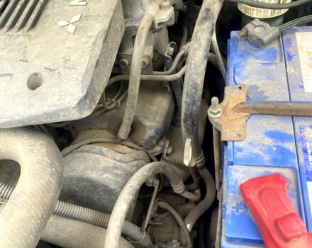 Зелений Міцубісі Паджеро Спорт, об'ємом двигуна 3 л та пробігом 315 тис. км за 4800 $, фото 6 на Automoto.ua