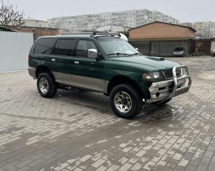 Зеленый Мицубиси Паджеро Спорт, объемом двигателя 2.5 л и пробегом 111 тыс. км за 3000 $, фото 3 на Automoto.ua