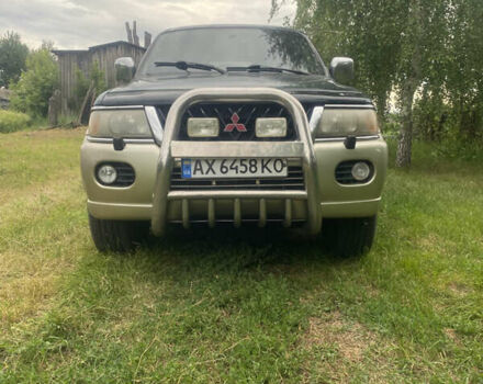 Зелений Міцубісі Паджеро Спорт, об'ємом двигуна 3 л та пробігом 315 тис. км за 5000 $, фото 1 на Automoto.ua