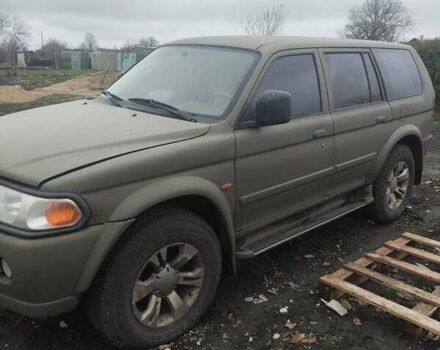 Зеленый Мицубиси Паджеро Спорт, объемом двигателя 2.97 л и пробегом 250 тыс. км за 4500 $, фото 1 на Automoto.ua