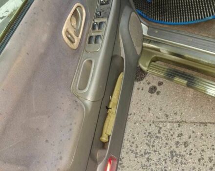 Зелений Міцубісі Паджеро Спорт, об'ємом двигуна 2.5 л та пробігом 250 тис. км за 5003 $, фото 6 на Automoto.ua