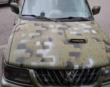 Зелений Міцубісі Паджеро Спорт, об'ємом двигуна 2.5 л та пробігом 250 тис. км за 5003 $, фото 5 на Automoto.ua