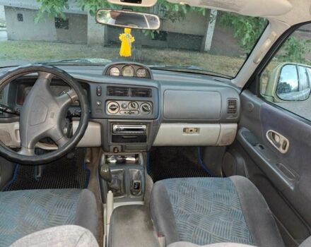 Зелений Міцубісі Паджеро Спорт, об'ємом двигуна 2.5 л та пробігом 250 тис. км за 5003 $, фото 4 на Automoto.ua