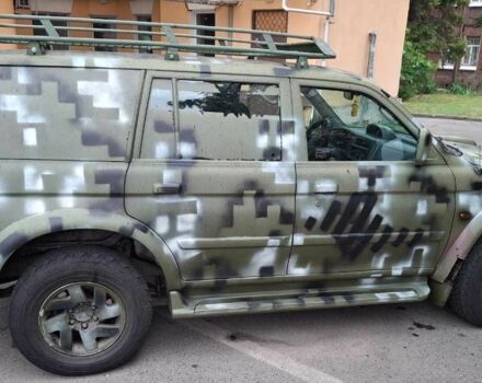 Зелений Міцубісі Паджеро Спорт, об'ємом двигуна 2.5 л та пробігом 250 тис. км за 5003 $, фото 10 на Automoto.ua