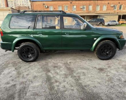 Зелений Міцубісі Паджеро Спорт, об'ємом двигуна 3 л та пробігом 289 тис. км за 2800 $, фото 4 на Automoto.ua