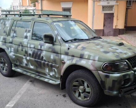 Зелений Міцубісі Паджеро Спорт, об'ємом двигуна 2.5 л та пробігом 250 тис. км за 5003 $, фото 12 на Automoto.ua