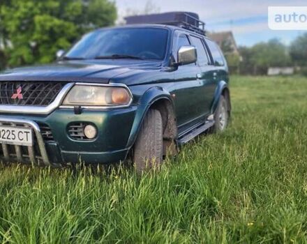 Зелений Міцубісі Паджеро Спорт, об'ємом двигуна 2.97 л та пробігом 400 тис. км за 7400 $, фото 26 на Automoto.ua