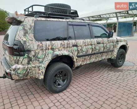 Зеленый Мицубиси Паджеро Спорт, объемом двигателя 3 л и пробегом 250 тыс. км за 6000 $, фото 2 на Automoto.ua