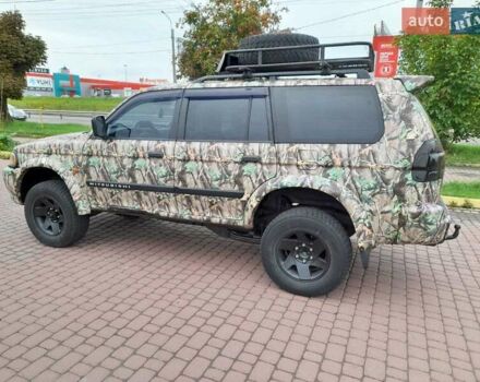 Зеленый Мицубиси Паджеро Спорт, объемом двигателя 3 л и пробегом 250 тыс. км за 6000 $, фото 1 на Automoto.ua