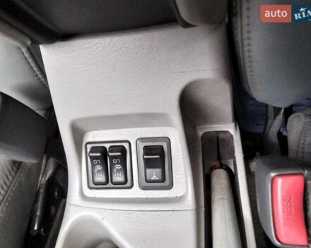 Зеленый Мицубиси Паджеро Спорт, объемом двигателя 3 л и пробегом 250 тыс. км за 6000 $, фото 9 на Automoto.ua