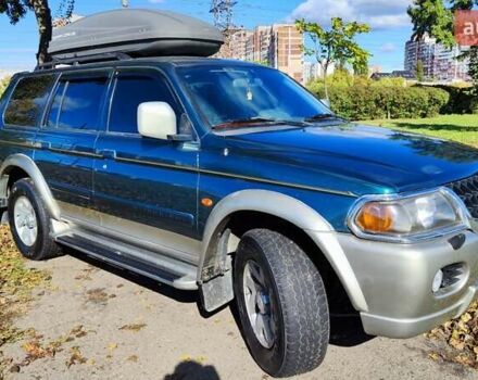 Зелений Міцубісі Паджеро Спорт, об'ємом двигуна 2.97 л та пробігом 230 тис. км за 7200 $, фото 5 на Automoto.ua