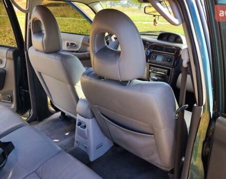 Зелений Міцубісі Паджеро Спорт, об'ємом двигуна 2.97 л та пробігом 230 тис. км за 7200 $, фото 12 на Automoto.ua